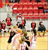  ??  ?? Pea Ridge senior Blakelee Winn pushes a Farmington defender while attempting to move her out of the way while an in-bounds pass was thrown in from the side. A foul was called against Farmington on this play and the Lady Blackhawks were awarded two free throws making 1-of-2 with 5 seconds left escaping with a 58-57 win on