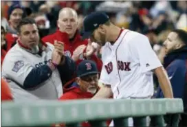  ?? MICHAEL DWYER — THE ASSOCIATED PRESS ?? Boston’s Chris Sale enters the dugout after pitching during the seventh inning of the team’s game against the Pittsburgh Pirates in Boston on Wednesday.