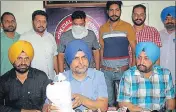  ?? HT PHOTO ?? ■ STF (border range) assistant inspector general (AIG) Rashpal Singh (centre) and his team addressing a press conference in Amritsar on Wednesday.