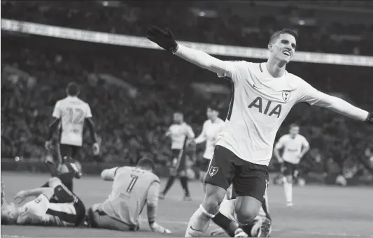  ??  ?? Tottenham Hotspur’s Erik Lamela celebrates scoring his side’s second goal against Newport County on Wednesday in London, England.