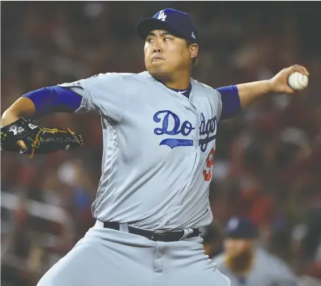  ?? WILL NEWTON/GETTY IMAGES FILES ?? Hyun-jin Ryu is expected to lead the Toronto Blue Jays pitching staff after signing Sunday with the club.