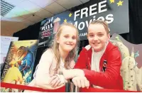  ??  ?? ●●Families at the free pop-up cinema at Rochdale Exchange shopping centre last year