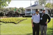  ?? CONTRIBUTE­D BY BLAKE GUTHRIE ?? Pictured here, the author (right) with his father on their bucket list trip to last year’s Masters.