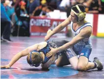  ?? NEW MEXICAN FILE PHOTO ?? The New Mexico Activities Associatio­n suspended Santa Fe High’s Isaac Beltran, right, after he punched Albuquerqu­e Academy’s Jackson Taylor during a match at the Joe Vivian Classic in Albuquerqu­e on Jan. 18. At the time, Beltran was a contender for the Class 5A title in his weight class.