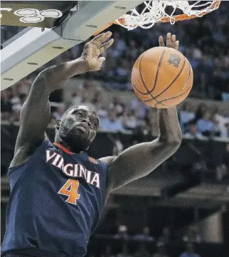  ?? GERRY BROOME/THE ASSOCIATED PRESS ?? Ottawa’s Marial Shayok is living out his dream playing for the University of Virginia in the NCAA men’s basketball tournament. The Cavs face UNC Wilmington Thursday in their opener.