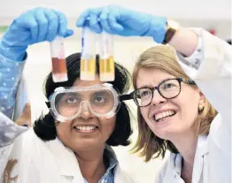  ?? PHOTO: PETER MCINTOSH ?? The National Isotope Centre’s Dr Karyne Rogers (right) and Lakmali Handagirip­athira, of Sri Lanka, work on a food adulterati­on detection method at Mellor Laboratori­es at the University of Otago.