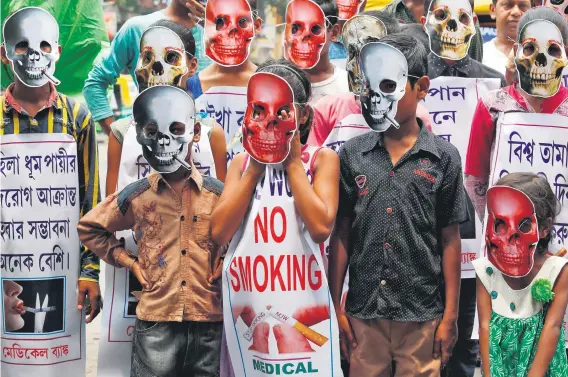  ?? Picture: Reuters ?? Children wearing masks attend an anti-tobacco awareness campaign to mark World No Tobacco Day in Kolkata, India, on Wednesday.