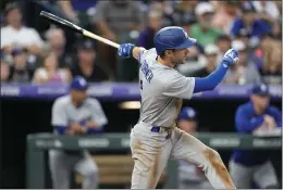  ?? DAVID ZALUBOWSKI – THE ASSOCIATED PRESS ?? Trea Turner follows through on his three-run double in the second inning on Thursday.