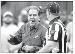  ?? AP/DAVID GOLDMAN ?? Alabama Coach Nick Saban won his sixth national championsh­ip Monday and fifth in nine seasons. The Crimson Tide defeated SEC rival Georgia 26-23 in overtime in Atlanta.