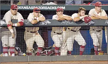  ?? NWA Democrat-Gazette/BEN GOFF ?? Arkansas players watch in disappoint­ment as Missouri State celebrates a 3-2 victory Monday to win the Fayettevil­le Regional of the NCAA Division I baseball tournament at Baum Stadium in Fayettevil­le. The 2017 season was a bounce-back campaign for the...