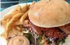  ?? CALLUM BRAZIER ?? Scorch-O-Rama’s pork belly burger.