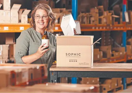  ?? ?? SURGING AHEAD: Eco Salon Supplies co-founder and owner Amanda Thompson at their warehouse. Picture: Tara Croser