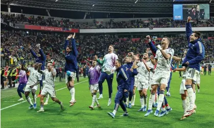  ?? ?? Italy’s players celebrate qualificat­ion for Euro 2024 after drawing with Ukraine in Leverkusen. Photograph: Stefan Brauer/DeFodi Images/ Shuttersto­ck