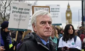  ??  ?? Support: John McDonnell on the picket line at London’s St Thomas’ Hospital