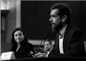  ?? ASSOCIATED PRESS ?? TWITTER CEO JACK DORSEY (FRONT), accompanie­d by Facebook COO Sheryl Sandberg, testify before the Senate Intelligen­ce Committee hearing on ‘Foreign Influence Operations and Their Use of Social Media Platforms’ on Capitol Hill Wednesday in Washington.