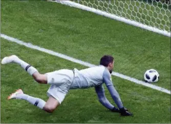  ?? HASSAN AMMAR — THE ASSOCIATED PRESS ?? Australia goalkeeper Mathew Ryan fails to save the ball as France’s Paul Pogba scores his side’s second goal during the group C match in Kazan, Russia on Saturday.