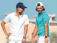  ?? ?? ■ Manchester City manager Pep Guardiola and Tommy Fleetwood during the Pro-Am at Saadiyat Beach Golf Club.