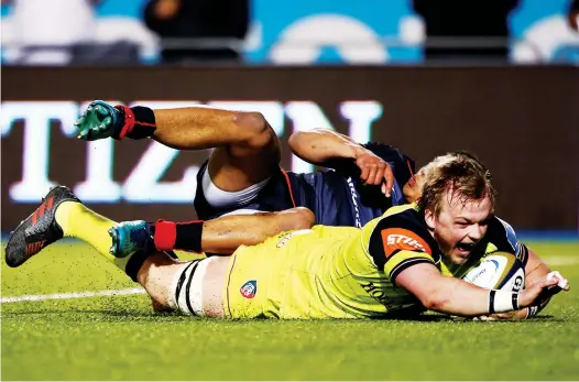  ?? PICTURES: Getty Images ?? On a roll: Luke Hamilton goes over to score Tigers’ second try