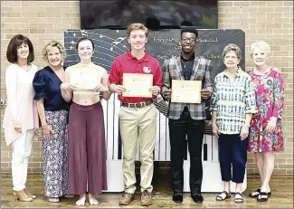  ?? Submitted Photo ?? Forrest City Musical Coterie awarded scholarshi­ps to three students during the group’s meeting at the Civic Center. Pictured, from left, are Coterie member Janet Northcutt,Carla Nimocks, scholarshi­p recipients Lauren Jones, Chandler Freligh and Allen Coleman, and Coterie members Mary Gehring and Lee O’Banion. The group is standing in front of a new sign made for the annual scholarshi­p program that displays, “Forrest City Musical Coterie Beth Burrow Jones Scholarshi­p.”