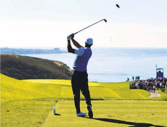  ?? U-T FILE ?? K.C. ALFRED Tiger Woods tees off on the south course of the Torrey Pines Golf Course during the Farmers Insurance Open in 2017.