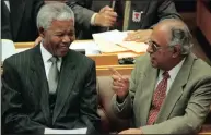  ?? PICTURE:AP ?? STALWARTS: Anti-apartheid activists and close friends, Nelson Mandela and Ahmed Kathrada, chat in Parliament in Cape Town. Kathrada died on Tuesday at the age of 87.