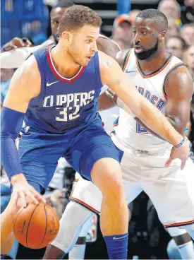  ?? [PHOTO BY BRYAN TERRY, THE OKLAHOMAN] ?? LA Clippers’ Blake Griffin, left, tries to get past Oklahoma City’s Raymond Felton during Friday’s game.