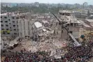  ??  ?? The ruins of the Rana Plaza building in Dhaka, Bangladesh. The building collapsed in 2013, killing more than 1,100 people. Photograph: Anadolu Agency/Getty Images