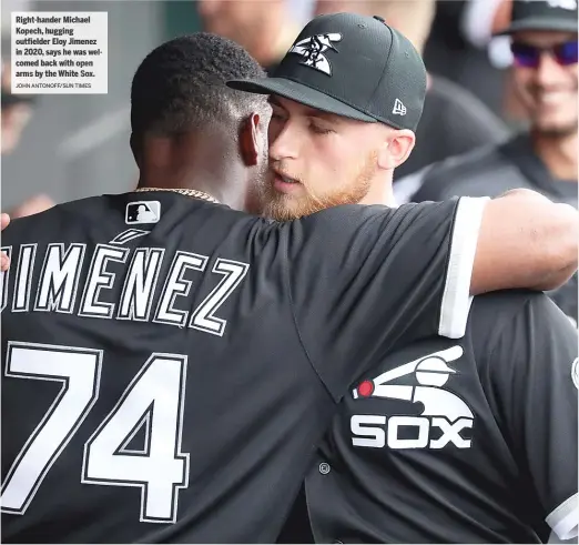  ?? JOHN ANTONOFF/SUN TIMES ?? Right-hander Michael Kopech, hugging outfielder Eloy Jimenez in 2020, says he was welcomed back with open arms by the White Sox.