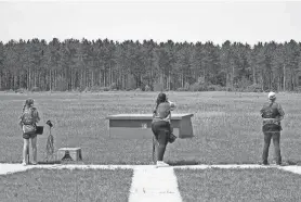  ?? PAUL A. SMITH ?? A competitor breaks a target at the 2022 Wisconsin High School Clay Target League State Championsh­ips.