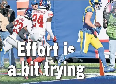  ?? Robert Sabo ?? KUPP AND AWAY: Cooper Kupp cruises into the end zone as Logan Ryan and James Bradberry, part of Big Blue’s high-priced secondary, can’t come close.