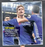  ??  ?? TOP MARC Alonso is hugged by team-mates after Chelsea go 2-0 ahead