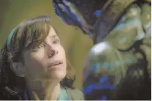  ??  ?? MACABRE FAIRY TALE: Sally Hawkins’ Elisa falls in love with a creature captured in the Amazon River in Guillermo del Toro’s ‘The Shape of Water.’
