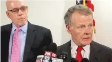  ?? | SUN- TIMES PHOTO ?? House Speaker Mike Madigan ( right) speaks with reporters on Tuesday as Rep. Greg Harris looks on.