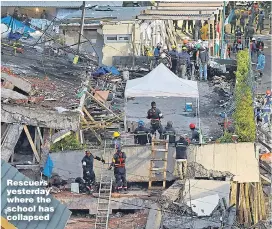  ?? Picture: DANIEL CARDENAS/GETTY ?? Rescuers yesterday where the school has collapsed