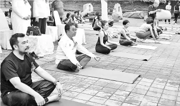  ??  ?? Abdul Karim (second left) with others during the stretching session.