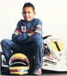  ??  ?? A young Lewis Hamilton pictured sitting on his go-kart in 1995