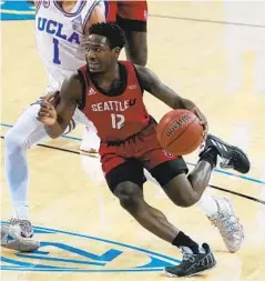  ?? MARCIO JOSE SANCHEZ AP ?? Incoming Aztec Darrion Trammell, driving on UCLA’s Jules Bernard, can score at all three levels, hit the open man and play tenacious defense.