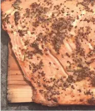  ?? JAN UEBELHERR ?? Cedar-Plank Salmon grills to perfection in about 15 minutes, but it also can be roasted in the oven.