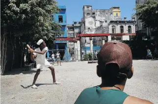  ?? JOE RAEDLE/GETTY IMAGES ?? Kids play baseball in Havana in March 2012. In the baseball world, there is broad expectatio­n that Cuba will soon be a replica of the Dominican Republic — a stupendous fount of all-star talent.