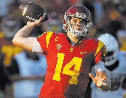  ?? Mark J. Terrill ?? The Associated Press As the Cleveland Browns continue their search for a quality quarterbac­k, Southern California’s Sam Darnold may just fit the bill.