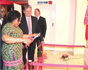  ??  ?? Manicaland Minister for Provincial Affairs Monica Mutsvangwa cuts the ribbon to officially open Croco Toyota Mutare