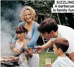  ??  ?? SIZZLING A barbecue is family fun