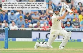  ?? — AP ?? England captain Joe Root plays a shot against India on the fourth day of their first Test at Trent Bridge in Nottingham on Saturday.