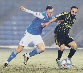  ??  ?? Jack Taylor (left) in action for Posh.