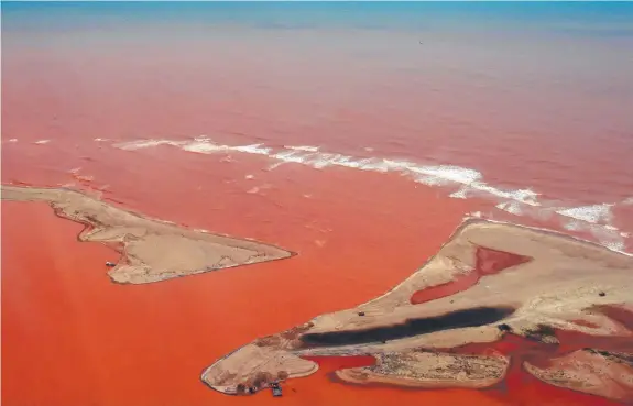  ?? ?? A view of the Doce River basin after being flooded with toxic sludge after the dam burst in 2015. Picture: Fred Loureiro/AFP