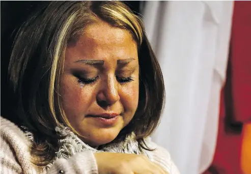  ?? — BILAL HUSSEIN/THE ASSOCIATED PRESS FILES ?? A Syrian woman who identified herself as Mae weeps as she speaks about her brother who was kidnapped in 2013. Later, a troupe of Syrian actors re-enacted her story on stage.