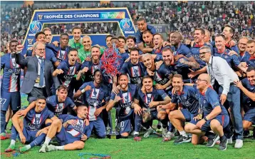  ?? — AFP ?? Players of the Paris Saint-germain team celebrate winning the French Champions Trophy at the Bloomfield Stadium in Tel Aviv on Sunday. PSG beat Nantes 4-0.