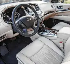  ??  ?? On the inside, the Infiniti QX60 has graphite weaver accents, a stitched upper dash and a shift lever shared with the new Q60 coupe. There is room for seven passengers in three rows.