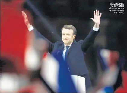  ?? Patrick Kovarik AFP/Getty Images ?? EMMANUEL MACRON’S election shows the center can still hold.