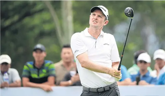  ??  ?? Justin Rose tees off during the second round at the Royale Jakarta Golf Club yesterday.